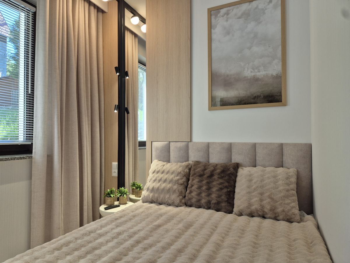 Sypialnia w apartamencie Heaven