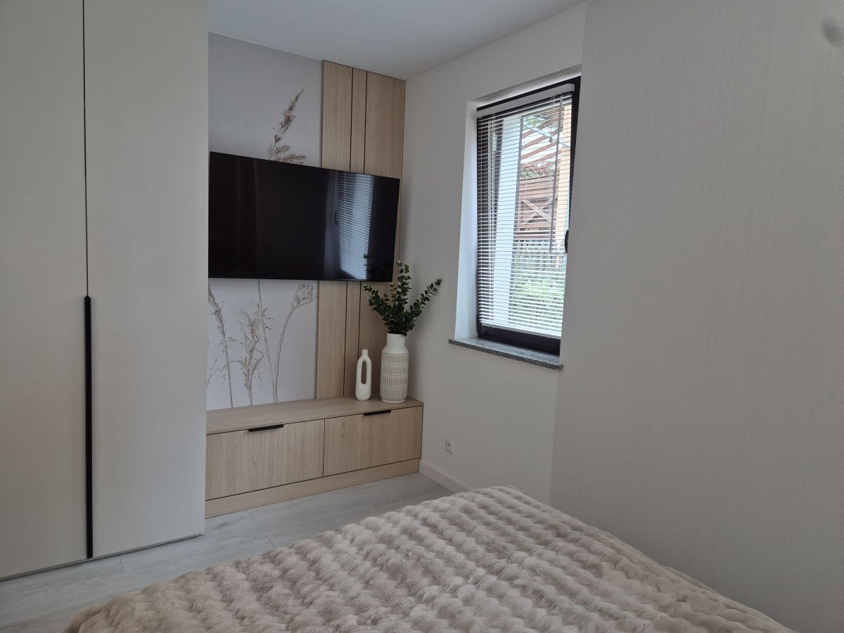 Sypialnia w apartamencie Heaven